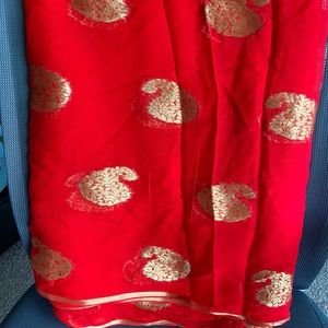 Brand new red and gold poly georgette saree